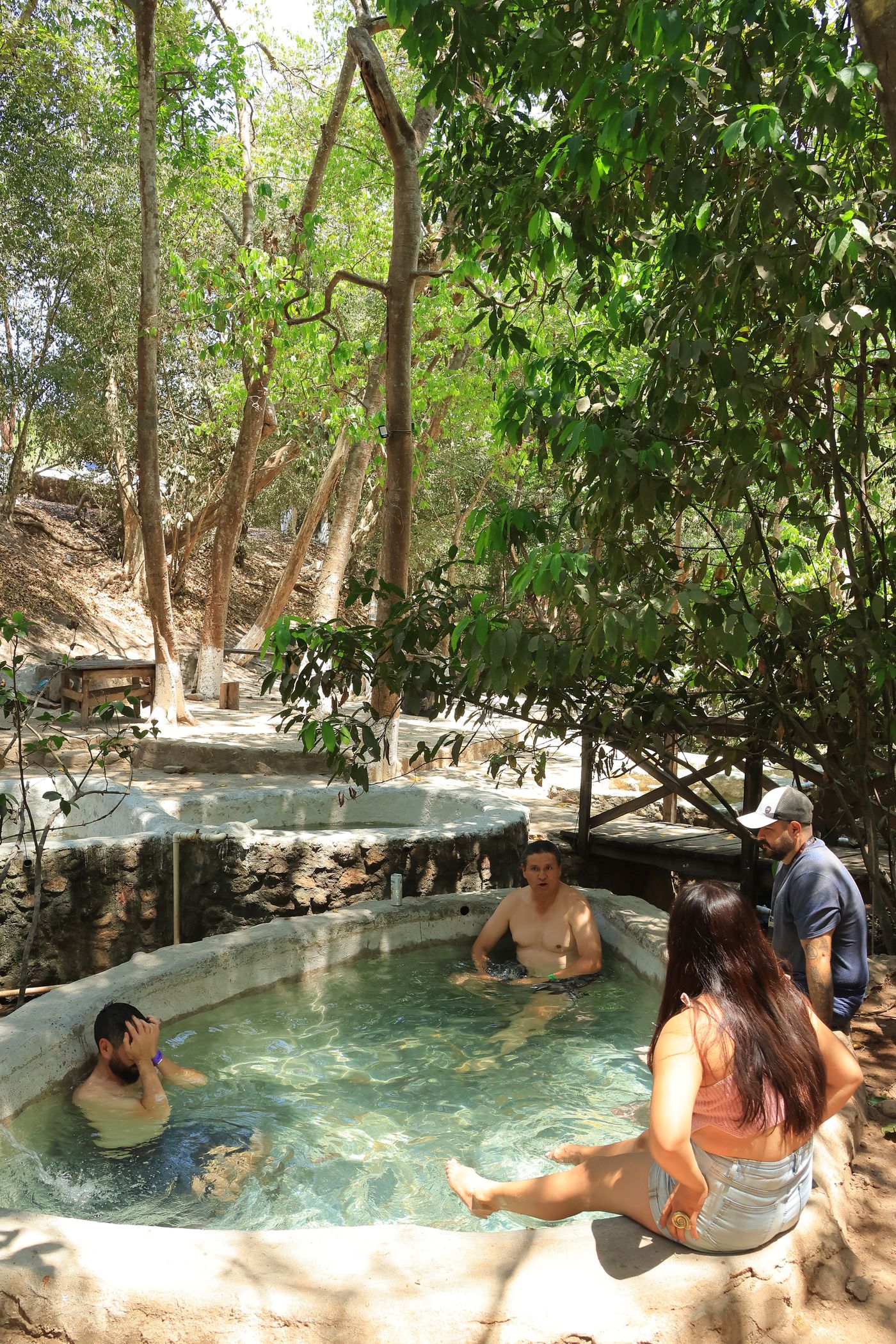 Guests enjoying hot springs during a RZR tour in Nayarit