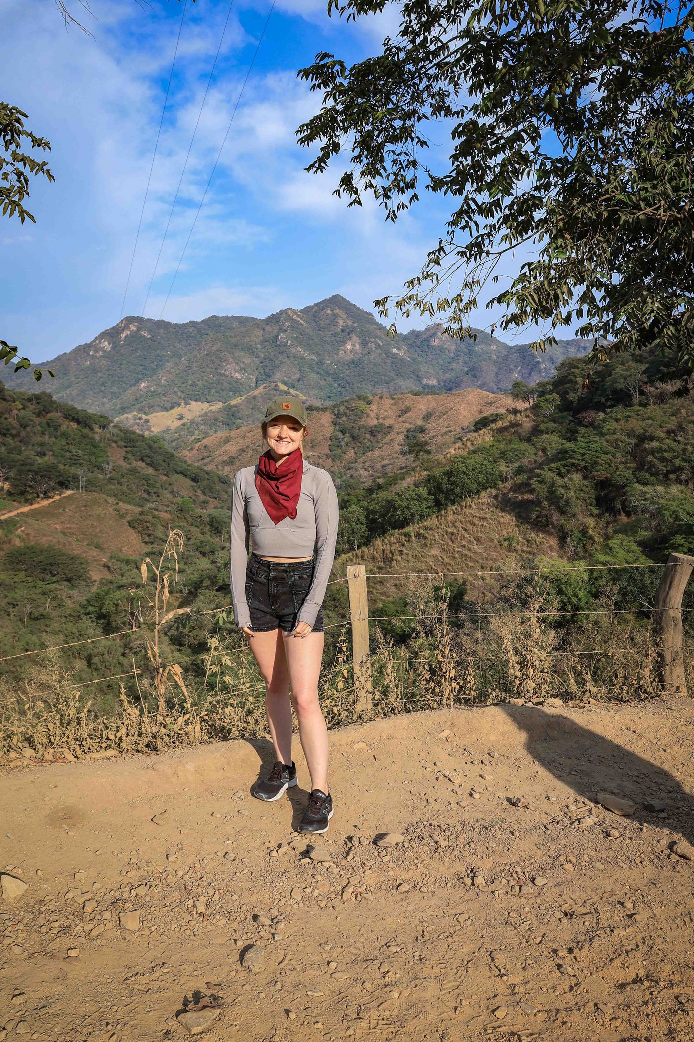 Guest enjoying a scenic mountain viewpoint during an ATV and RZR tour in Puerto Vallarta.