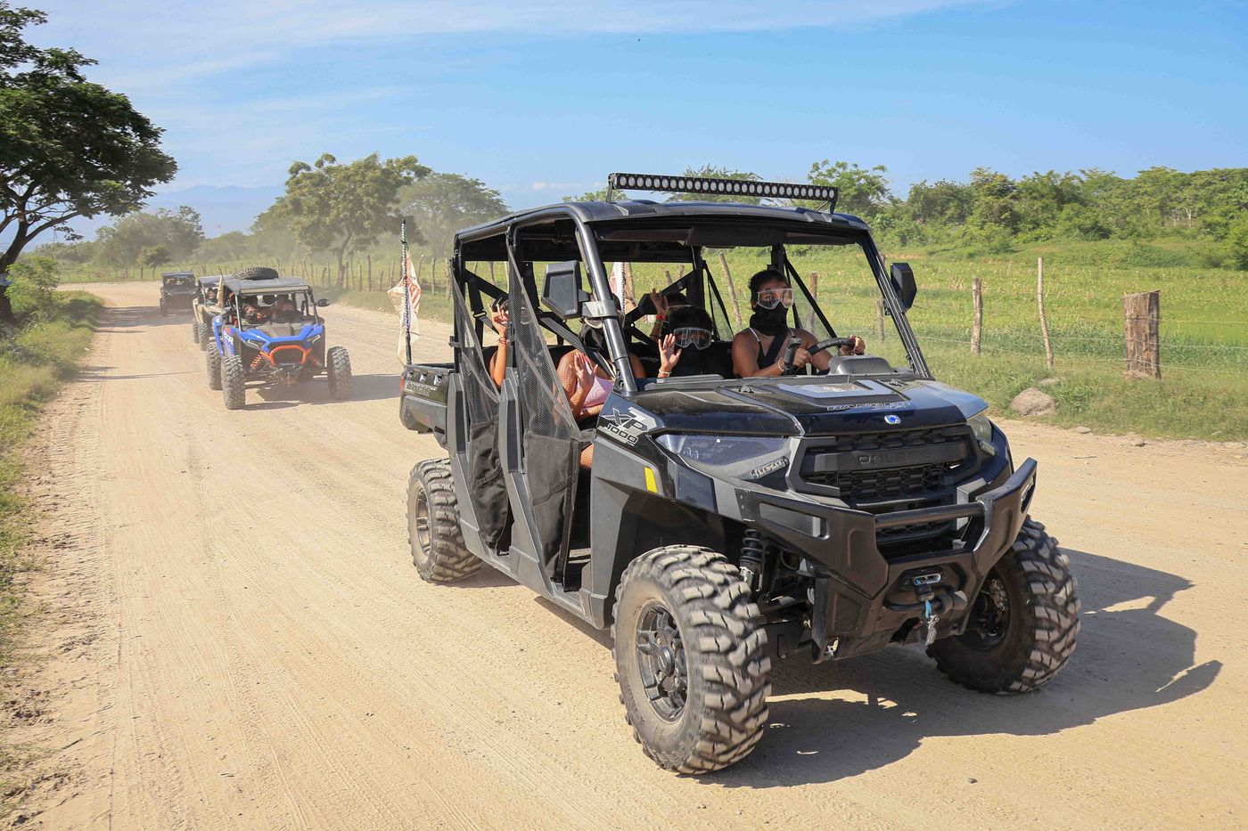 Group riding RZR vehicles on an off-road adventure in Nayarit