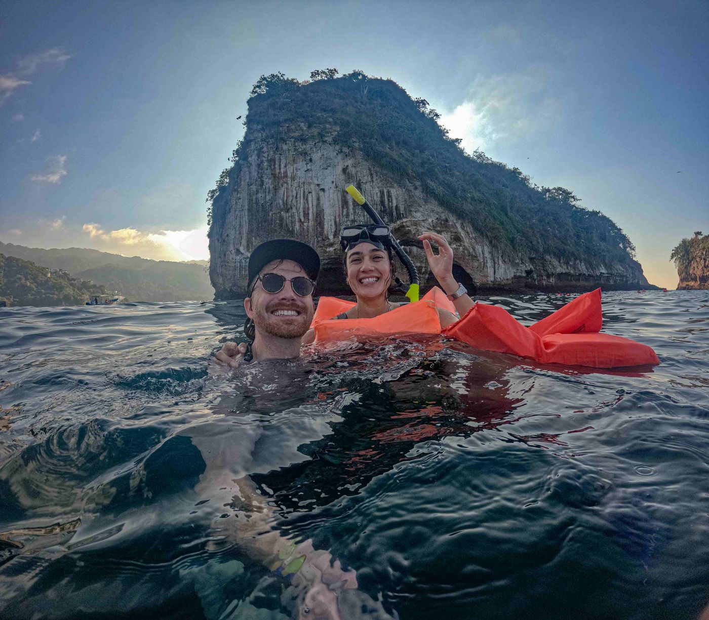 Guests enjoying a snorkeling experience in crystal-clear waters